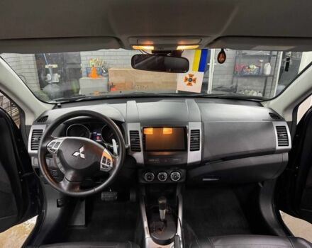 Черный Мицубиси Аутлендер, объемом двигателя 2.4 л и пробегом 305 тыс. км за 10000 $, фото 8 на Automoto.ua