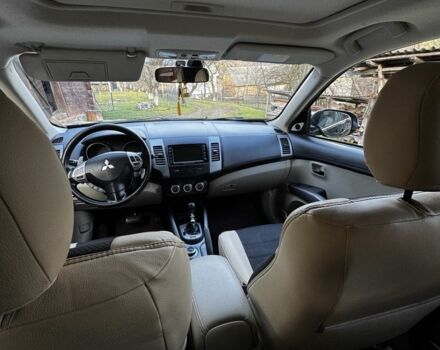 Черный Мицубиси Аутлендер, объемом двигателя 2.2 л и пробегом 249 тыс. км за 11500 $, фото 5 на Automoto.ua