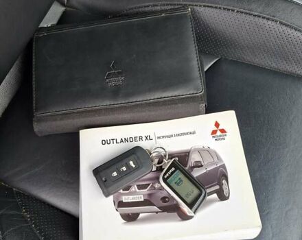 Мицубиси Аутлендер 2010 в Чернигове на Automoto.ua Черный Мицубиси Аутлендер, объемом двигателя 2.4 л и пробегом 180 тыс. км за 11500 $, фото 31 на Automoto.ua