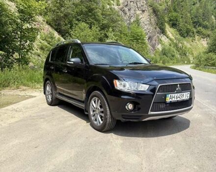 Черный Мицубиси Аутлендер, объемом двигателя 2.4 л и пробегом 275 тыс. км за 12000 $, фото 1 на Automoto.ua