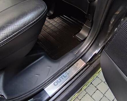 Черный Мицубиси Аутлендер, объемом двигателя 2 л и пробегом 210 тыс. км за 10600 $, фото 15 на Automoto.ua