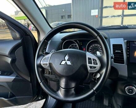Черный Мицубиси Аутлендер, объемом двигателя 2.2 л и пробегом 264 тыс. км за 10700 $, фото 24 на Automoto.ua