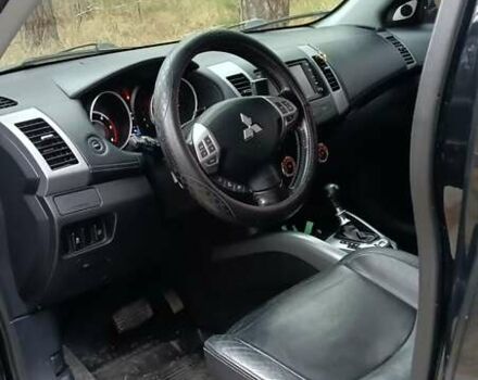 Черный Мицубиси Аутлендер, объемом двигателя 2.2 л и пробегом 267 тыс. км за 9999 $, фото 2 на Automoto.ua