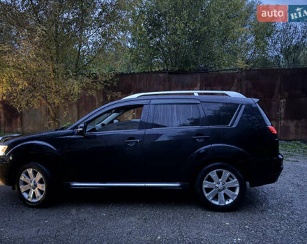 Чорний Міцубісі Аутлендер, об'ємом двигуна 2 л та пробігом 258 тис. км за 8699 $, фото 19 на Automoto.ua