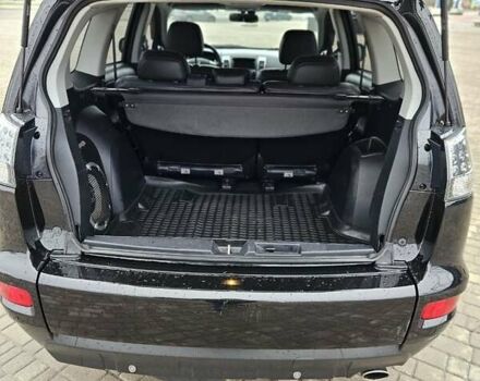 Чорний Міцубісі Аутлендер, об'ємом двигуна 2.4 л та пробігом 70 тис. км за 13000 $, фото 18 на Automoto.ua