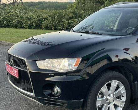 Черный Мицубиси Аутлендер, объемом двигателя 0 л и пробегом 257 тыс. км за 10399 $, фото 5 на Automoto.ua