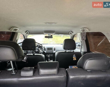 Черный Мицубиси Аутлендер, объемом двигателя 1.97 л и пробегом 224 тыс. км за 9000 $, фото 8 на Automoto.ua