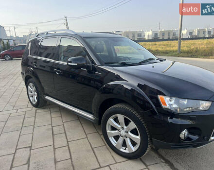 Чорний Міцубісі Аутлендер, об'ємом двигуна 2.36 л та пробігом 244 тис. км за 9850 $, фото 16 на Automoto.ua