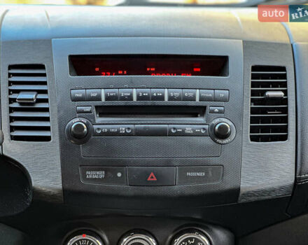 Черный Мицубиси Аутлендер, объемом двигателя 2.2 л и пробегом 226 тыс. км за 11500 $, фото 87 на Automoto.ua