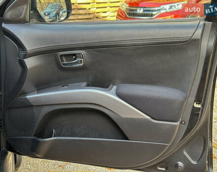 Черный Мицубиси Аутлендер, объемом двигателя 2.2 л и пробегом 226 тыс. км за 11500 $, фото 96 на Automoto.ua