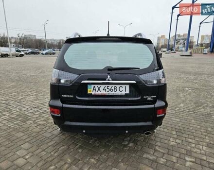 Чорний Міцубісі Аутлендер, об'ємом двигуна 2.4 л та пробігом 70 тис. км за 13000 $, фото 3 на Automoto.ua