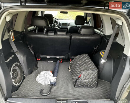 Черный Мицубиси Аутлендер, объемом двигателя 1.97 л и пробегом 224 тыс. км за 9000 $, фото 6 на Automoto.ua