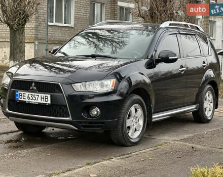 Чорний Міцубісі Аутлендер, об'ємом двигуна 2.36 л та пробігом 197 тис. км за 11300 $, фото 7 на Automoto.ua