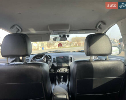Черный Мицубиси Аутлендер, объемом двигателя 2.36 л и пробегом 244 тыс. км за 9850 $, фото 21 на Automoto.ua