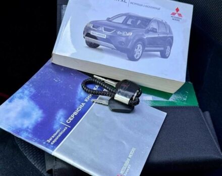 Черный Мицубиси Аутлендер, объемом двигателя 2 л и пробегом 225 тыс. км за 9900 $, фото 23 на Automoto.ua
