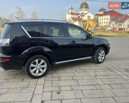 Чорний Міцубісі Аутлендер, об'ємом двигуна 2.36 л та пробігом 244 тис. км за 9850 $, фото 13 на Automoto.ua