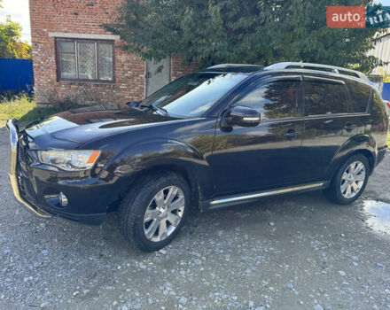 Чорний Міцубісі Аутлендер, об'ємом двигуна 2 л та пробігом 258 тис. км за 8699 $, фото 8 на Automoto.ua