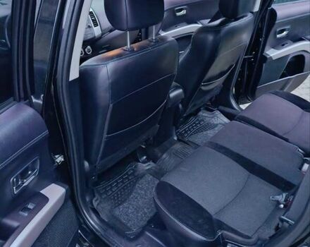 Черный Мицубиси Аутлендер, объемом двигателя 2.2 л и пробегом 225 тыс. км за 11500 $, фото 7 на Automoto.ua