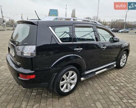 Чорний Міцубісі Аутлендер, об'ємом двигуна 2.4 л та пробігом 70 тис. км за 13000 $, фото 4 на Automoto.ua