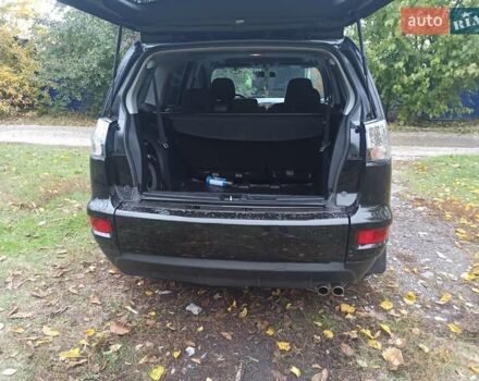 Черный Мицубиси Аутлендер, объемом двигателя 3 л и пробегом 240 тыс. км за 9500 $, фото 12 на Automoto.ua