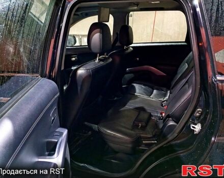 Черный Мицубиси Аутлендер, объемом двигателя 2.4 л и пробегом 70 тыс. км за 10500 $, фото 8 на Automoto.ua