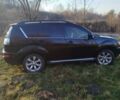 Черный Мицубиси Аутлендер, объемом двигателя 2 л и пробегом 261 тыс. км за 9700 $, фото 2 на Automoto.ua