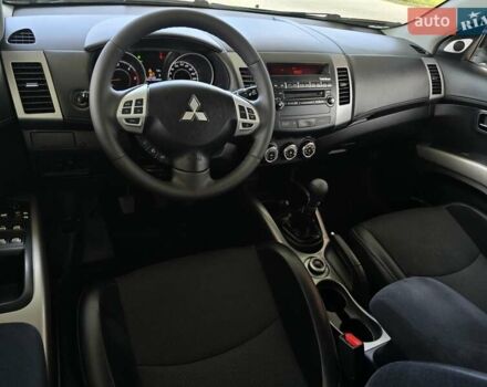 Мицубиси Аутлендер 2010 в Калуше на Automoto.ua Черный Мицубиси Аутлендер, объемом двигателя 1.97 л и пробегом 270 тыс. км за 11700 $, фото 28 на Automoto.ua