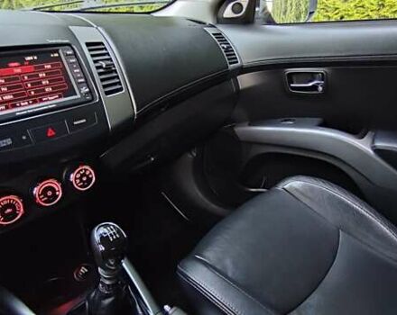 Черный Мицубиси Аутлендер, объемом двигателя 2 л и пробегом 210 тыс. км за 10600 $, фото 21 на Automoto.ua