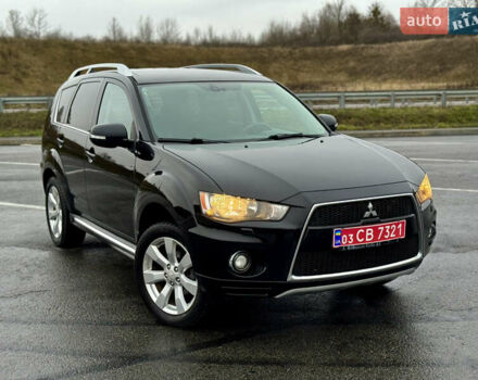 Чорний Міцубісі Аутлендер, об'ємом двигуна 2 л та пробігом 228 тис. км за 10550 $, фото 45 на Automoto.ua
