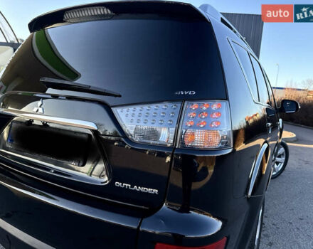 Черный Мицубиси Аутлендер, объемом двигателя 2.2 л и пробегом 263 тыс. км за 11300 $, фото 8 на Automoto.ua