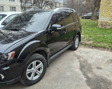 Черный Мицубиси Аутлендер, объемом двигателя 2.4 л и пробегом 198 тыс. км за 10500 $, фото 2 на Automoto.ua