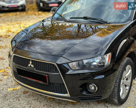 Черный Мицубиси Аутлендер, объемом двигателя 2.2 л и пробегом 226 тыс. км за 11500 $, фото 32 на Automoto.ua
