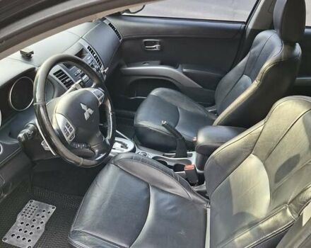 Мицубиси Аутлендер 2010 в Чернигове на Automoto.ua Черный Мицубиси Аутлендер, объемом двигателя 2.4 л и пробегом 180 тыс. км за 11500 $, фото 18 на Automoto.ua