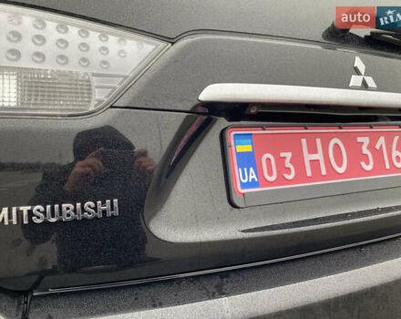 Черный Мицубиси Аутлендер, объемом двигателя 2.2 л и пробегом 227 тыс. км за 10700 $, фото 20 на Automoto.ua