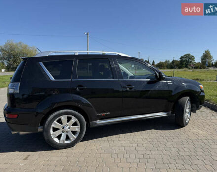 Чорний Міцубісі Аутлендер, об'ємом двигуна 2.36 л та пробігом 235 тис. км за 12500 $, фото 11 на Automoto.ua