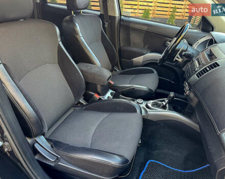 Черный Мицубиси Аутлендер, объемом двигателя 2.2 л и пробегом 226 тыс. км за 11500 $, фото 97 на Automoto.ua