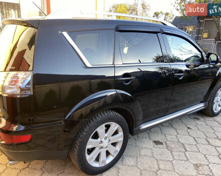 Черный Мицубиси Аутлендер, объемом двигателя 1.97 л и пробегом 292 тыс. км за 10900 $, фото 4 на Automoto.ua