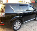 Черный Мицубиси Аутлендер, объемом двигателя 1.97 л и пробегом 292 тыс. км за 10900 $, фото 4 на Automoto.ua
