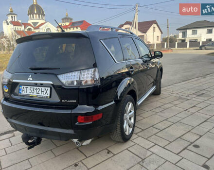 Чорний Міцубісі Аутлендер, об'ємом двигуна 2.36 л та пробігом 244 тис. км за 9850 $, фото 17 на Automoto.ua
