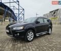 Чорний Міцубісі Аутлендер, об'ємом двигуна 2.4 л та пробігом 70 тис. км за 13000 $, фото 1 на Automoto.ua