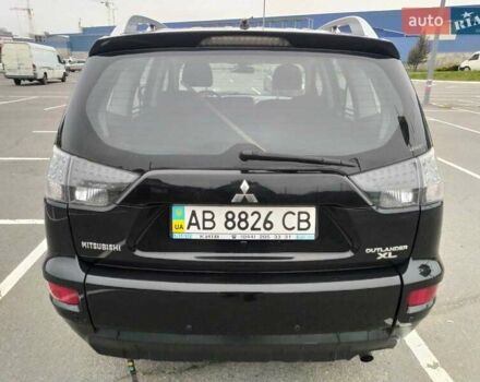 Чорний Міцубісі Аутлендер, об'ємом двигуна 2 л та пробігом 226 тис. км за 10750 $, фото 4 на Automoto.ua