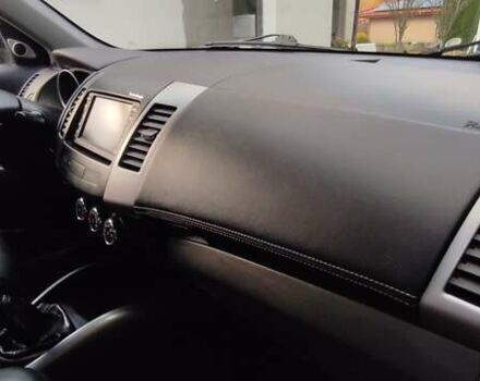 Черный Мицубиси Аутлендер, объемом двигателя 2 л и пробегом 210 тыс. км за 10600 $, фото 19 на Automoto.ua