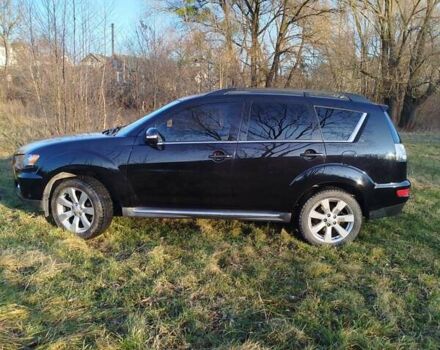 Черный Мицубиси Аутлендер, объемом двигателя 2 л и пробегом 261 тыс. км за 9700 $, фото 11 на Automoto.ua