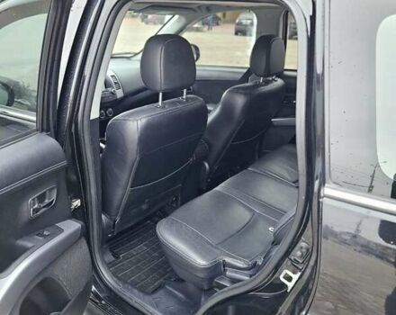 Чорний Міцубісі Аутлендер, об'ємом двигуна 2.4 л та пробігом 70 тис. км за 13000 $, фото 15 на Automoto.ua