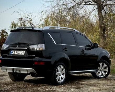 Черный Мицубиси Аутлендер, объемом двигателя 2 л и пробегом 300 тыс. км за 5500 $, фото 7 на Automoto.ua