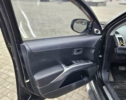 Чорний Міцубісі Аутлендер, об'ємом двигуна 2.4 л та пробігом 70 тис. км за 13000 $, фото 9 на Automoto.ua