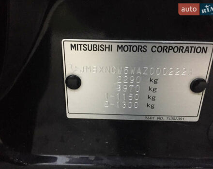 Черный Мицубиси Аутлендер, объемом двигателя 2.36 л и пробегом 315 тыс. км за 9700 $, фото 16 на Automoto.ua