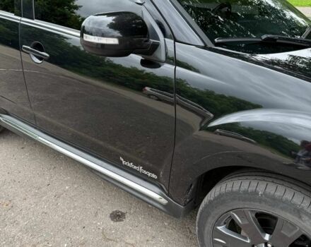 Чорний Міцубісі Аутлендер, об'ємом двигуна 2 л та пробігом 210 тис. км за 10700 $, фото 2 на Automoto.ua