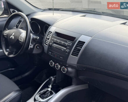 Черный Мицубиси Аутлендер, объемом двигателя 2.2 л и пробегом 225 тыс. км за 10950 $, фото 31 на Automoto.ua