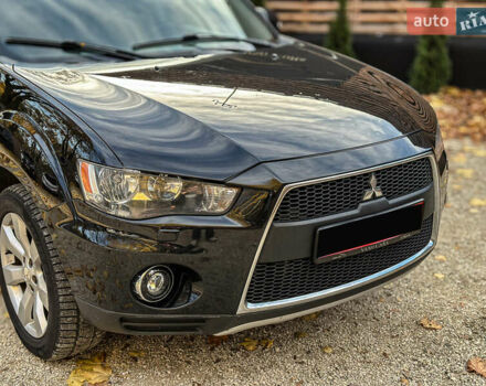 Черный Мицубиси Аутлендер, объемом двигателя 2.2 л и пробегом 226 тыс. км за 11500 $, фото 25 на Automoto.ua